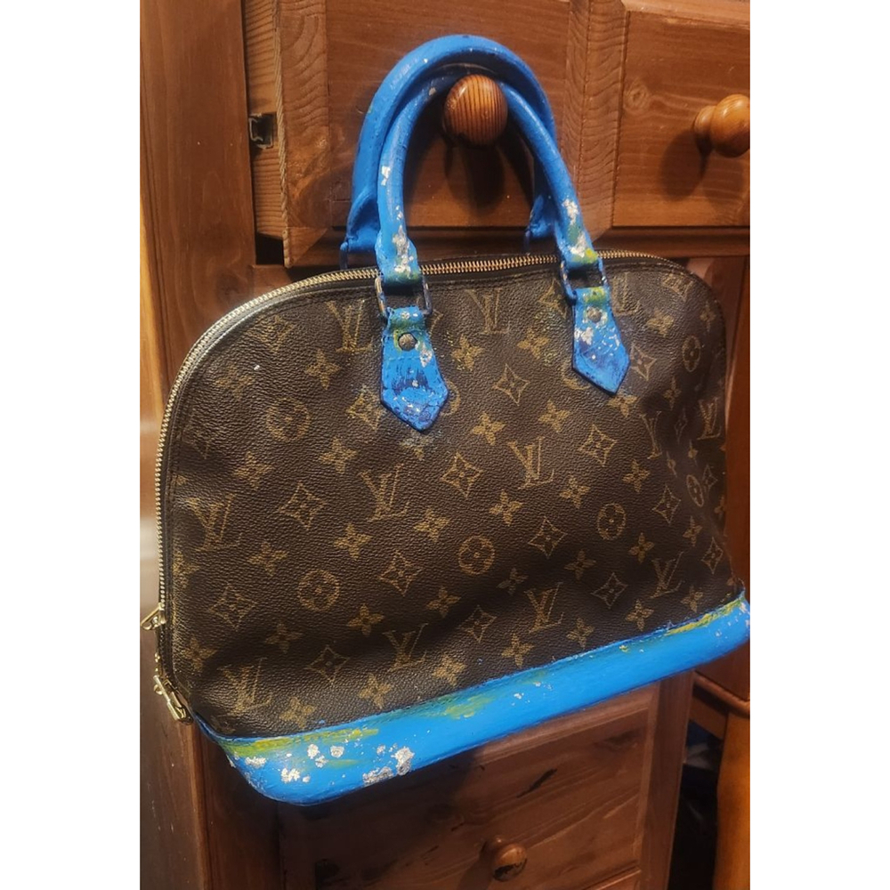 LOUIS VUITTON ALMA PM